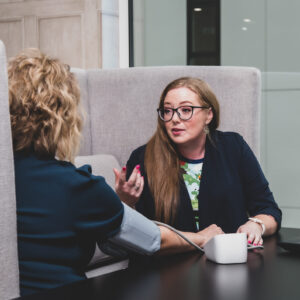 Blood pressure check, health conversation