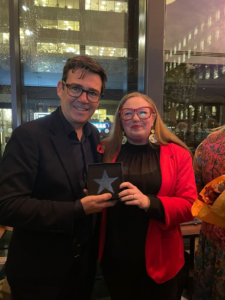 Emma with Andy Burnham and her Tech for Good Award